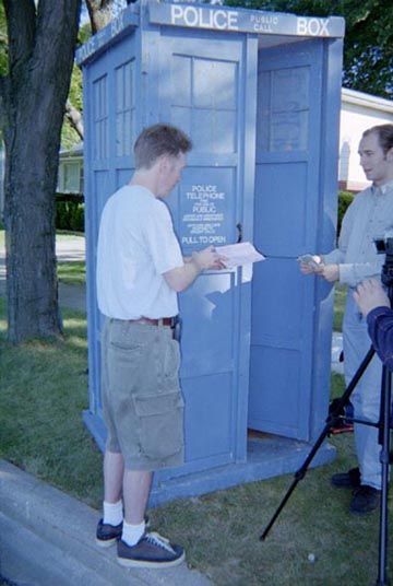 Production Note:  We actually filmed the exchange of a handful of dollars for the deed to Mike's car.