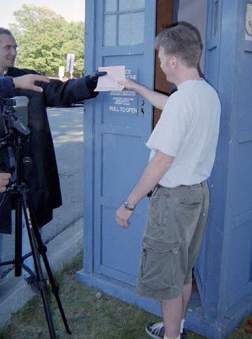 Mike, operating the camera, REALLY wants the deed to his car back.